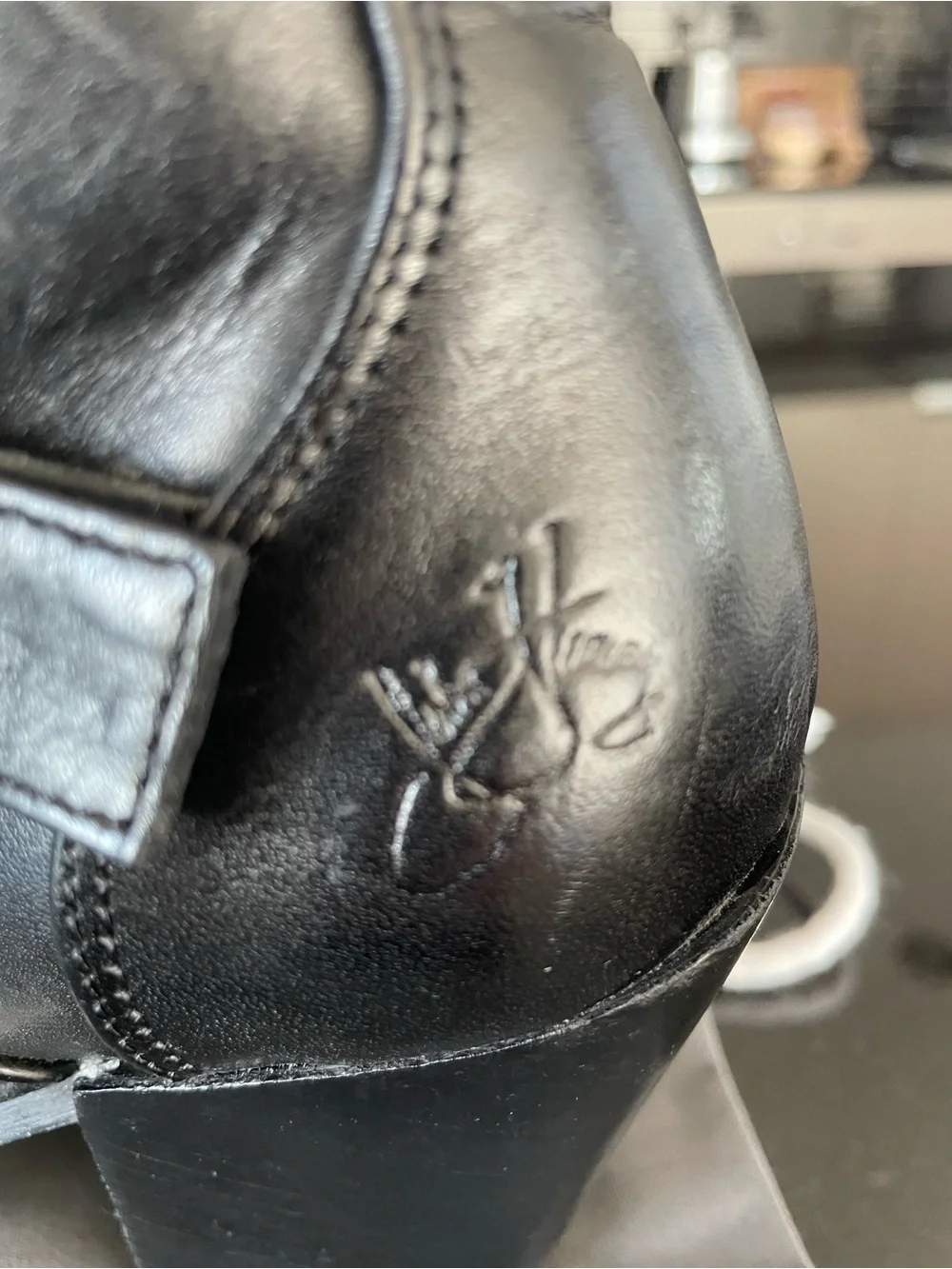 John Fluevog, black swordfish buckle/zip boot. Size 7.